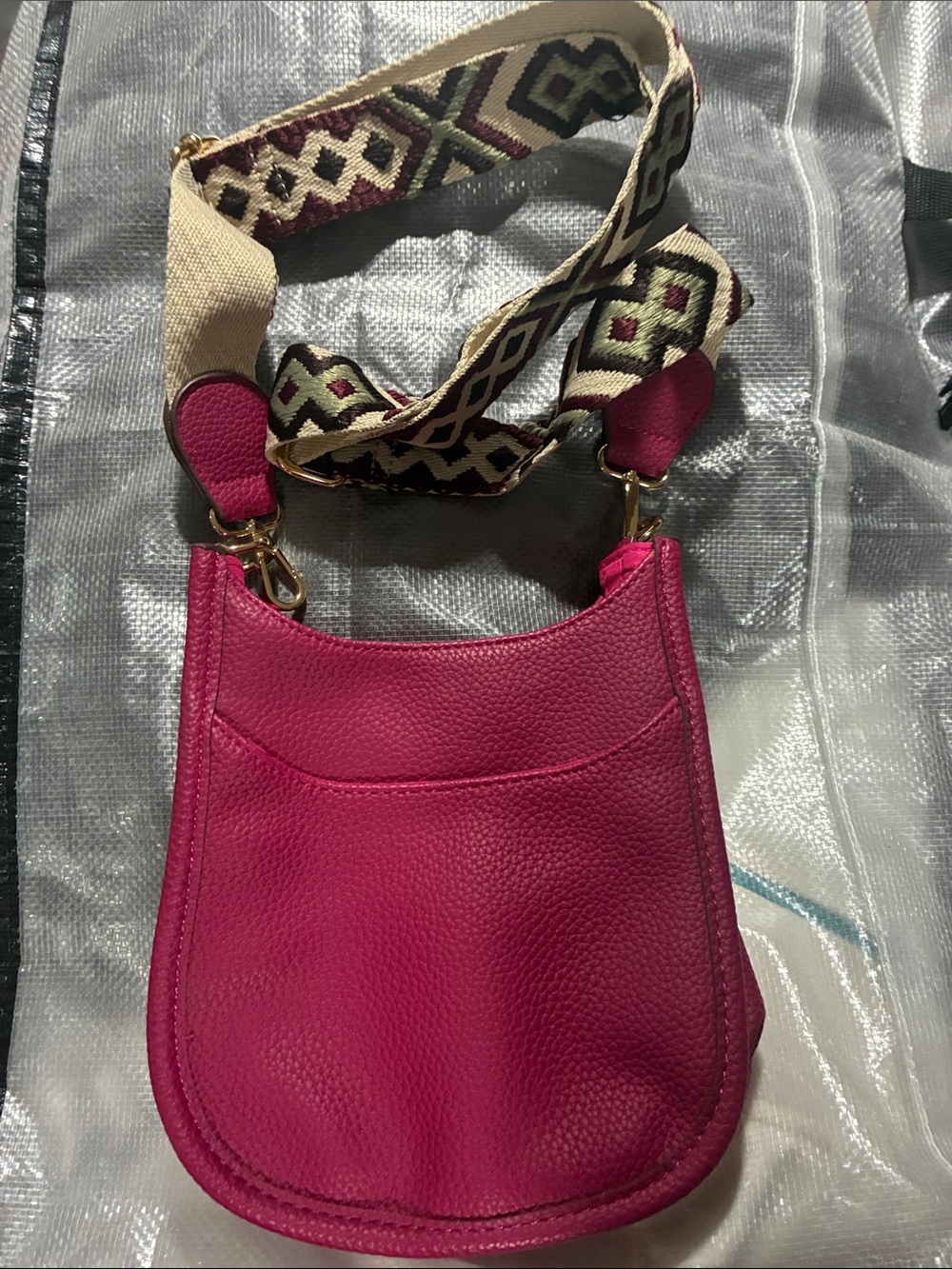 Bright Pink Pebble Leather Crossbody Bag with Patterned Strap